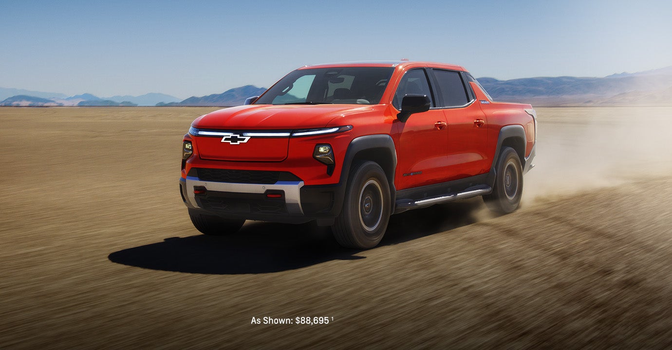 2026 Silverado EV driving in a desert